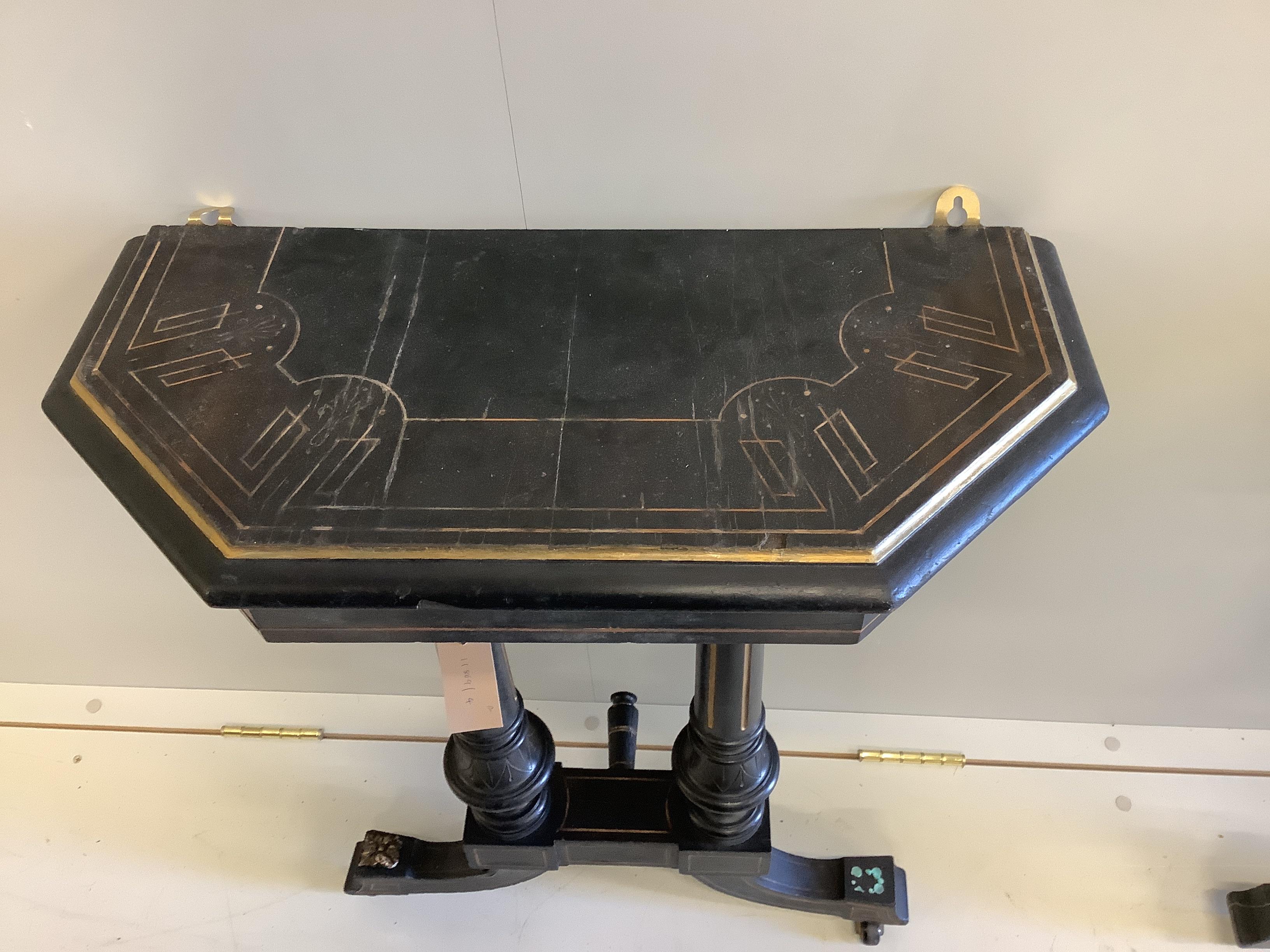 A pair of late Victorian ebonised hall tables, altered, width 53cm, depth 26cm, height 76cm.